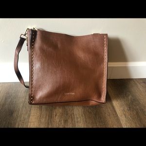 Brown Calvin Klein purse with attached black insert